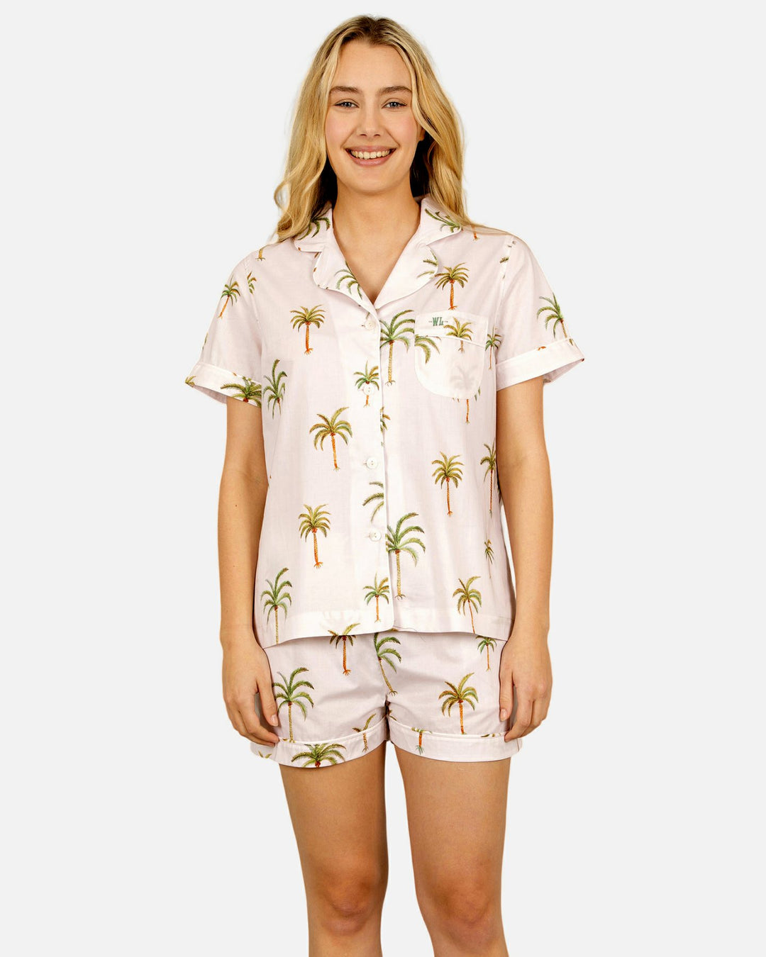Womens short sleeved cream colored pyjamas with palm trees