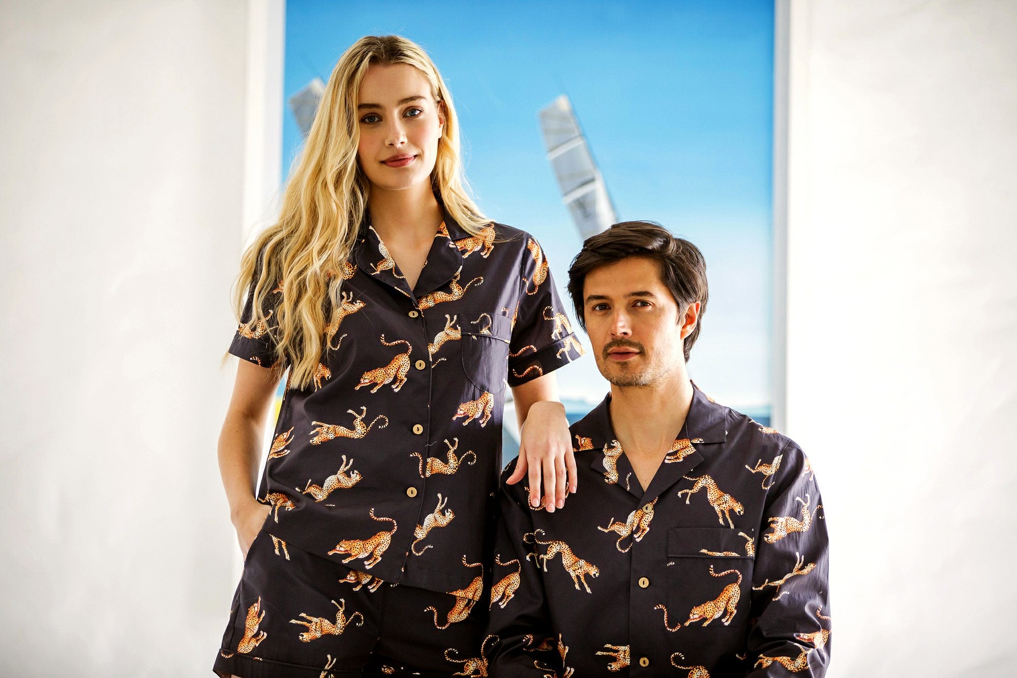 Mens black pyjamas with jumping cheetahs