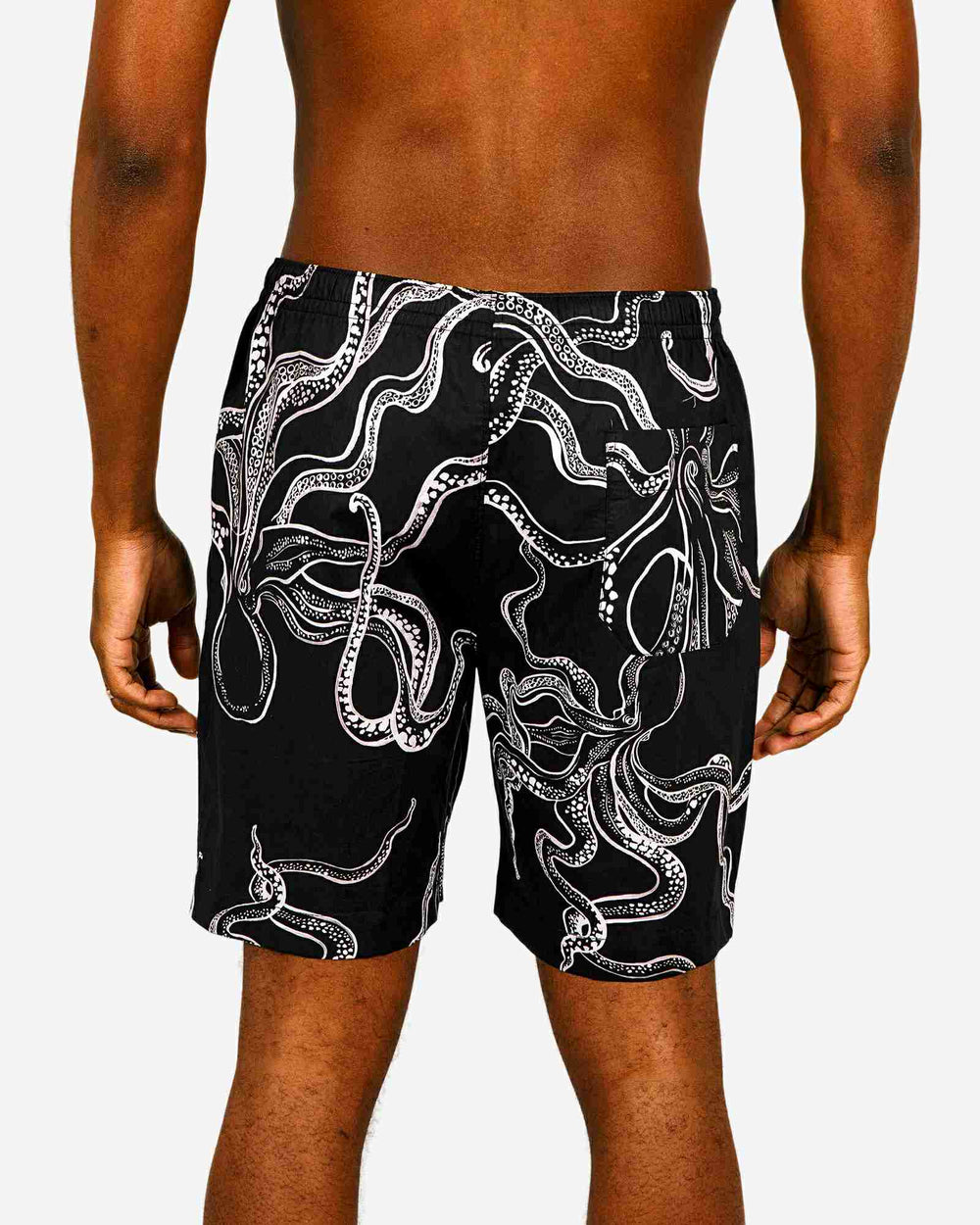 Mens lounge shorts with white octopuses on a black background