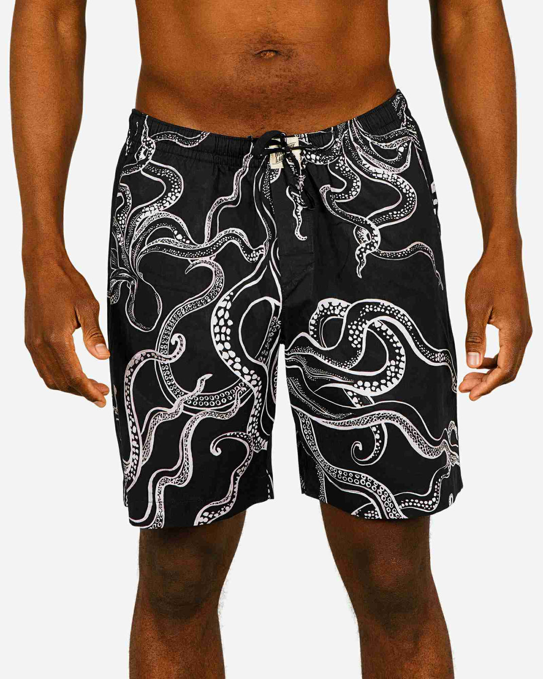 Mens lounge shorts with white octopuses on a black background