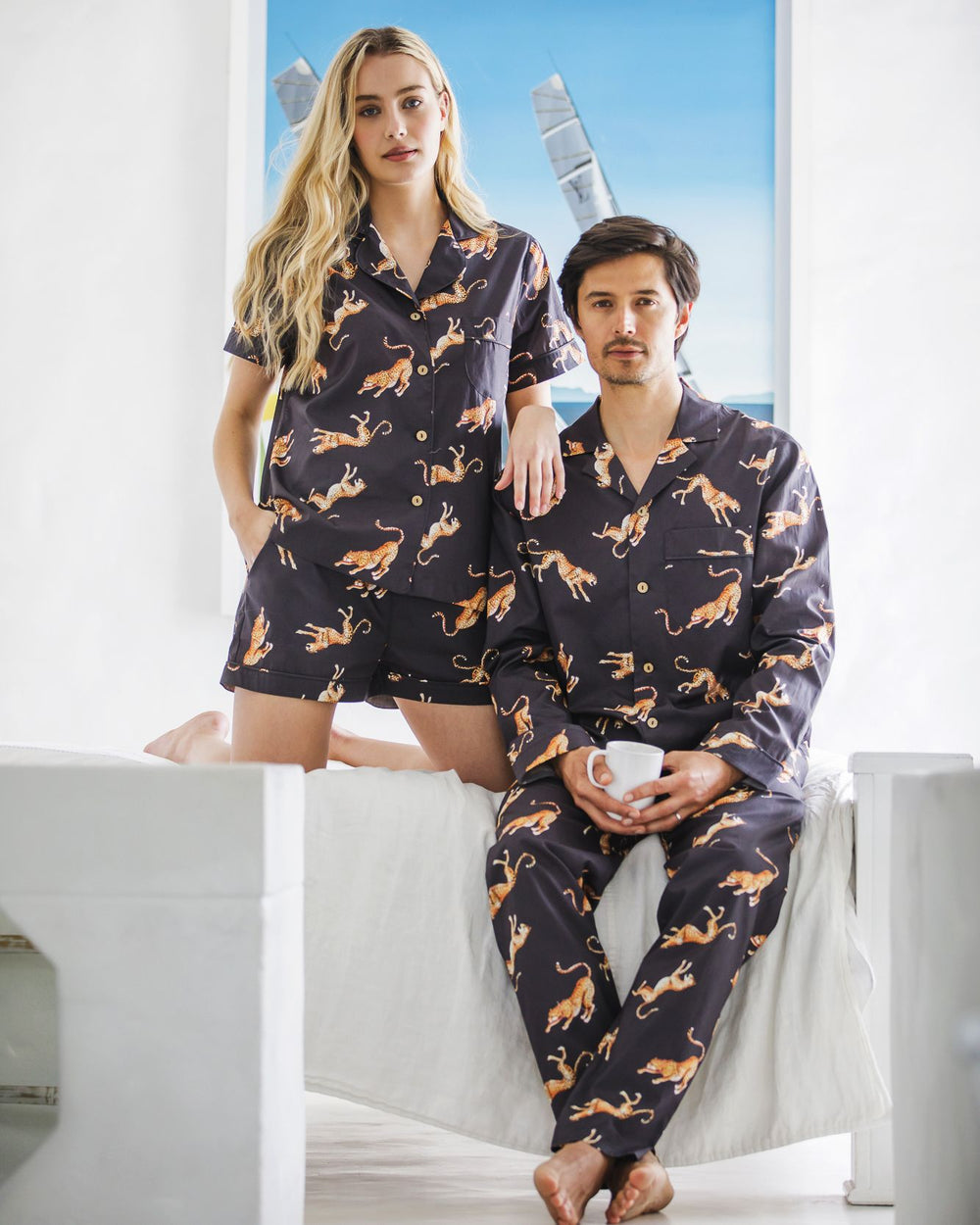 Mens black pyjamas set with jumping cheetahs