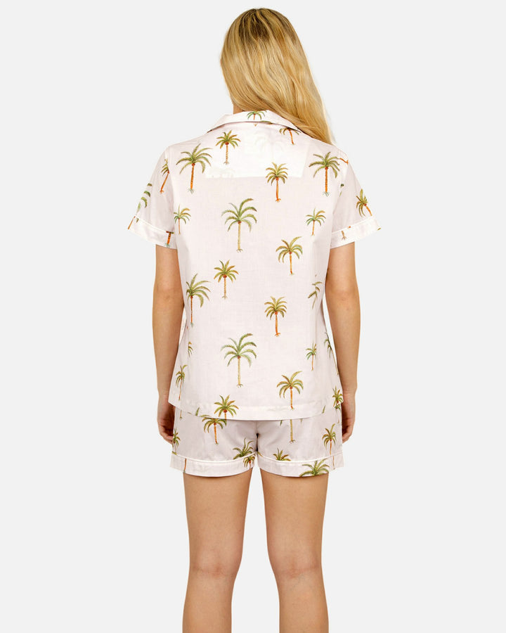 Womens short sleeved cream colored pyjamas with palm trees