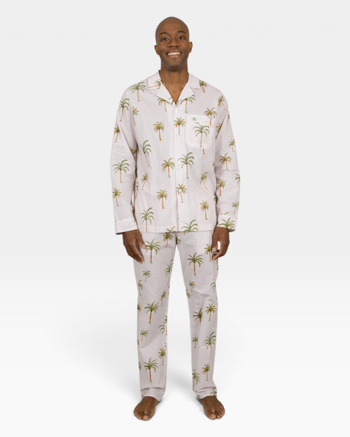 Mens beige two piece pyjamas set with palm trees.