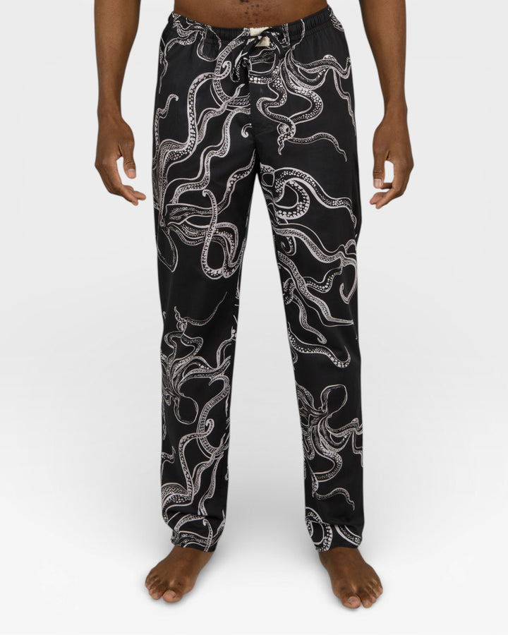 Mens thin black lounge pants with white octopuses.