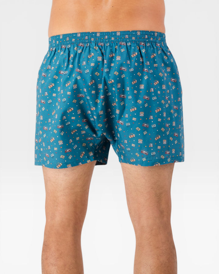 Back view of mens blue boxer shorts with boombox print