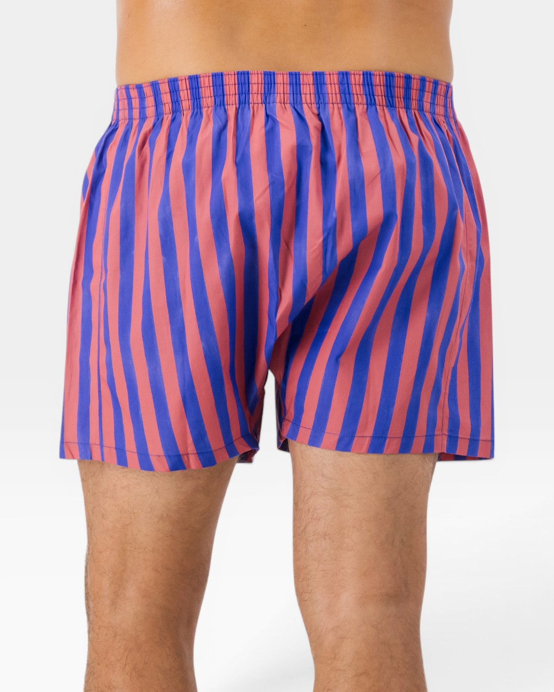 Back view of mens boxer shorts with bold blue and red stripes