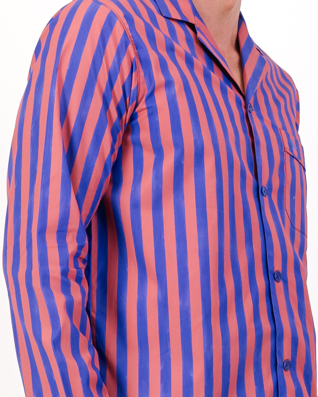 Close-up of blue and red striped cotton pyjama shirt