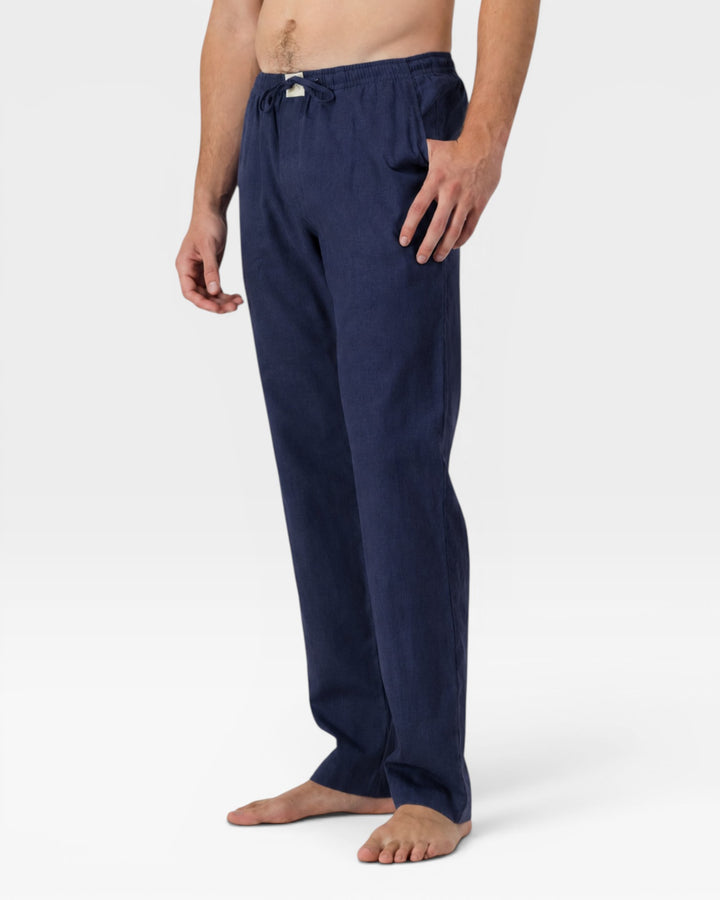Mens dark blue linen pants from the side.