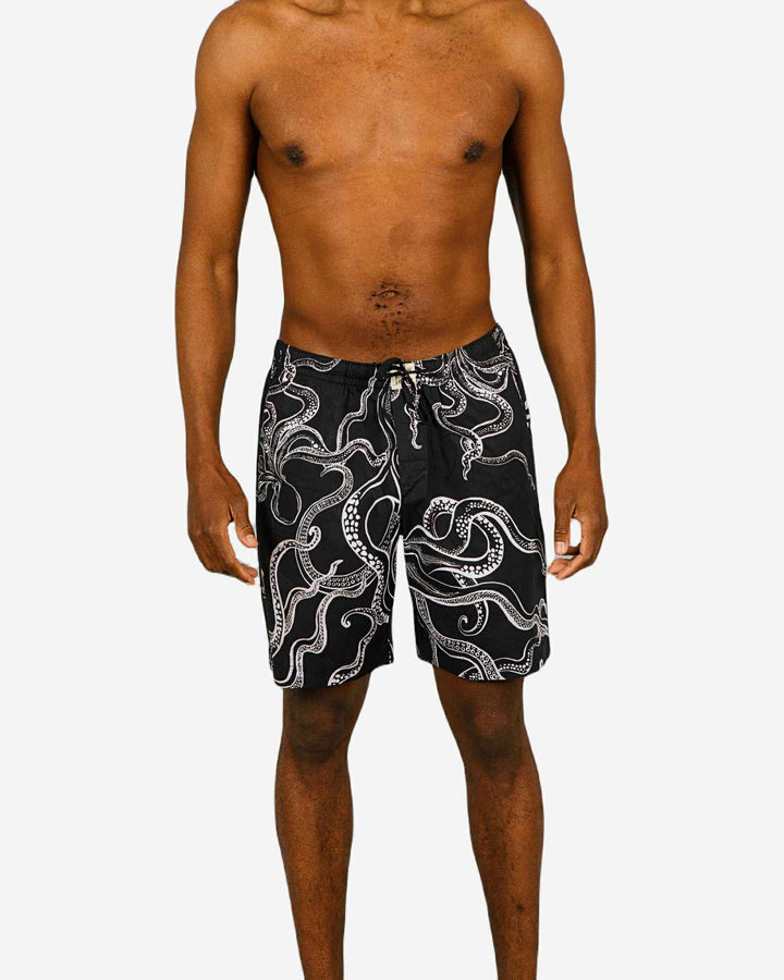 Mens lounge shorts with white octopuses on a black background