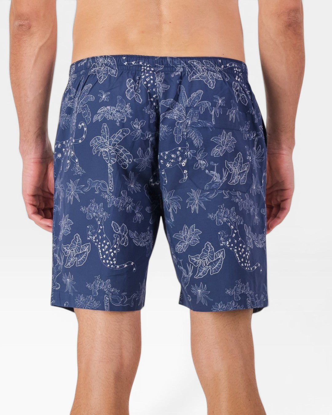 Man wearing navy tropical leopard lounge shorts