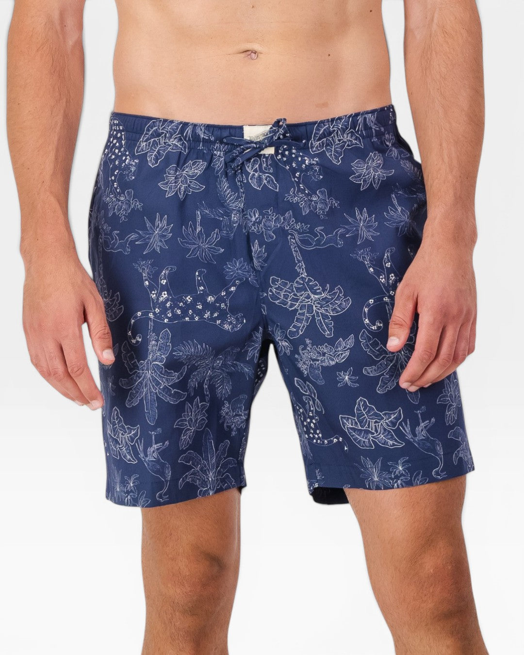 Man wearing navy tropical leopard lounge shorts