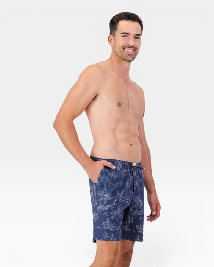 Man wearing navy tropical leopard lounge shorts
