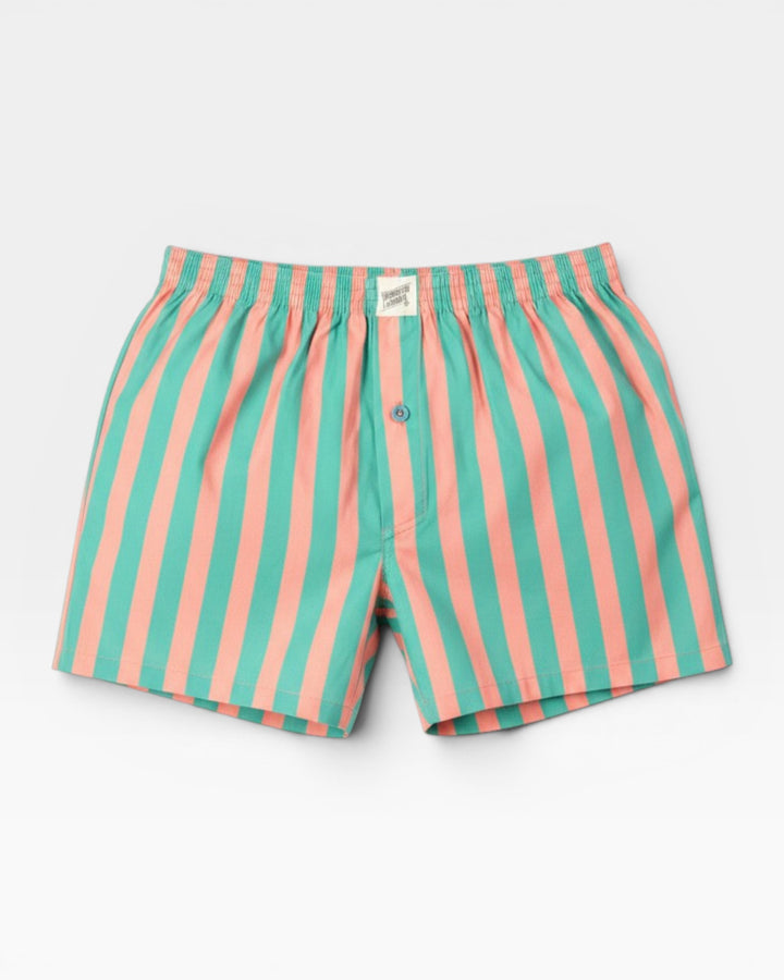 Close-up of mens pink and green striped boxer shorts in cotton poplin