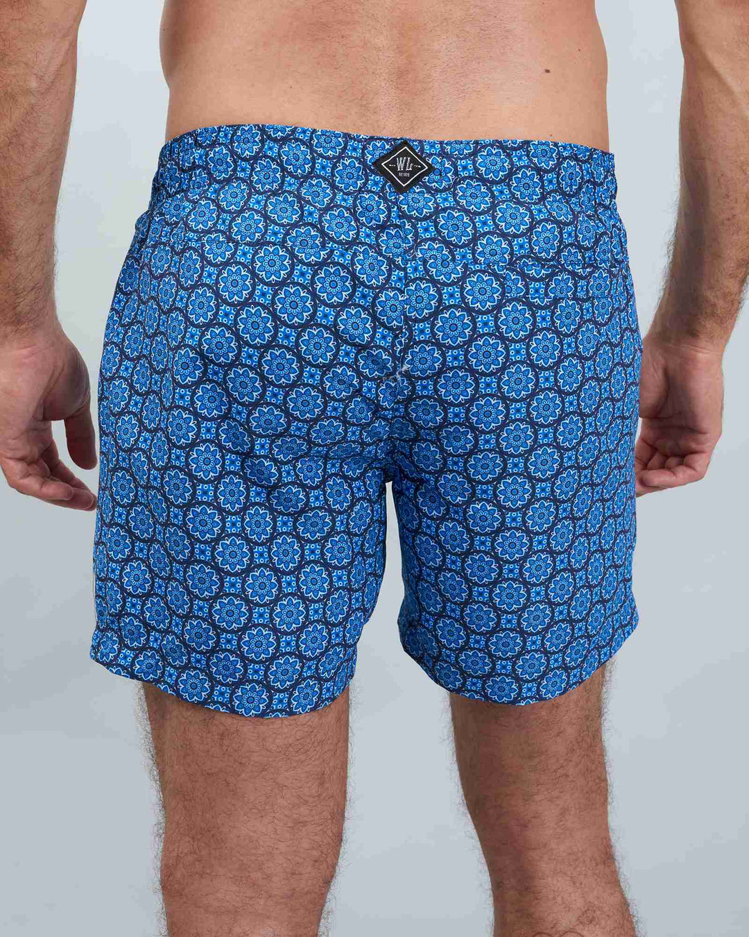 Mens blue swim shorts - indigo floral