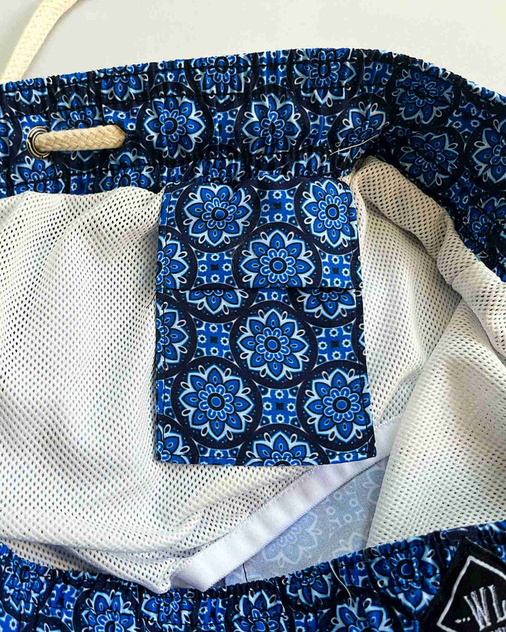 Mens blue swim shorts - indigo floral