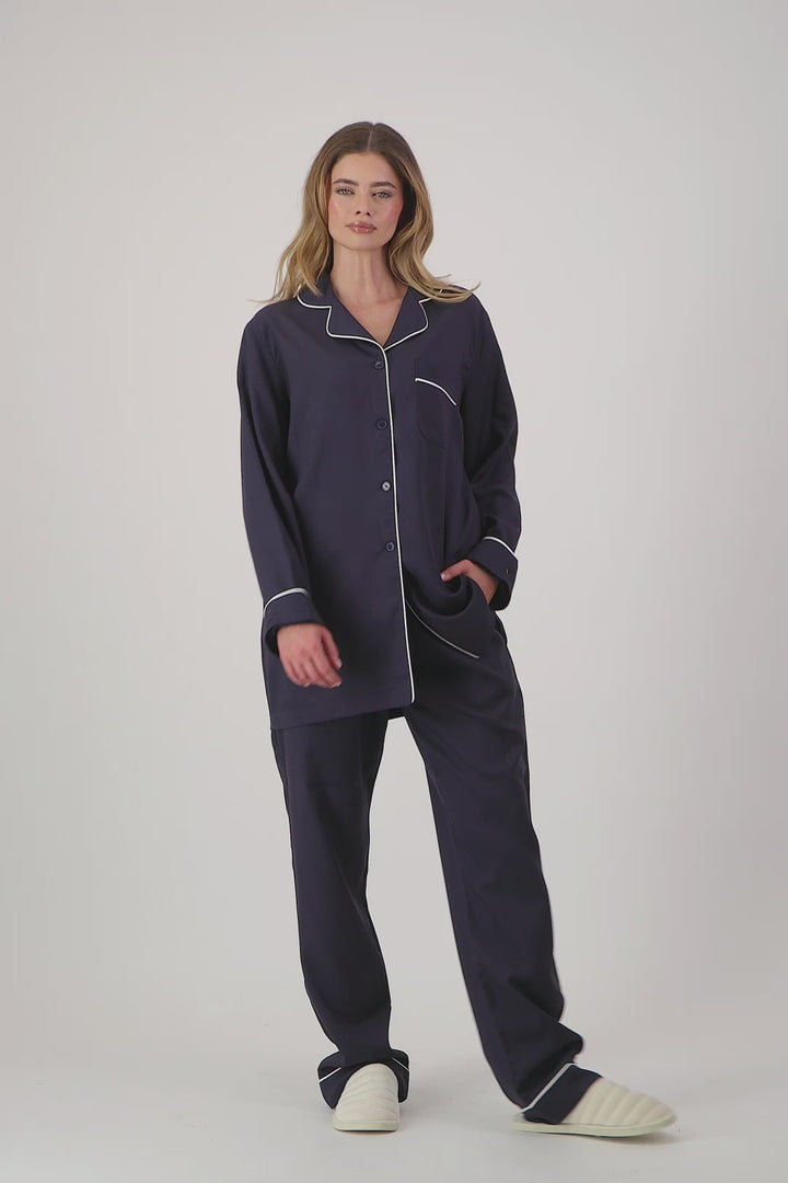 Women in navy tencel pyjamas