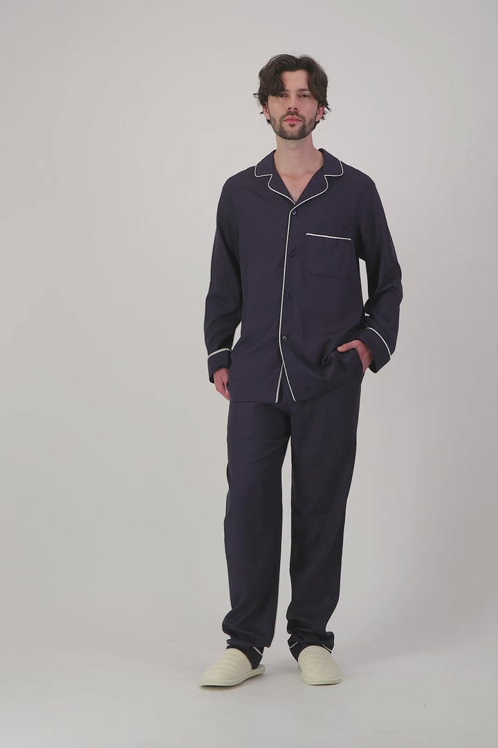 Man in navy tencel pyjamas