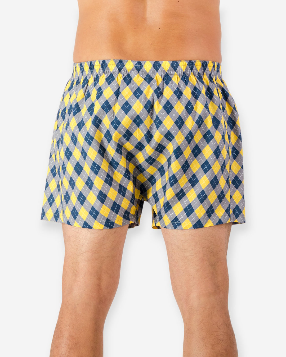 Yellow and blue checkered boxer shorts on a white background